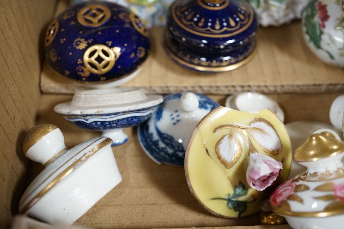 A collection of porcelain tureen and pot covers, largely 19th century